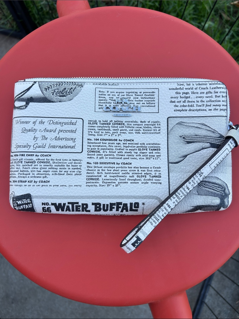 Coach Newsprint Print Wristlet